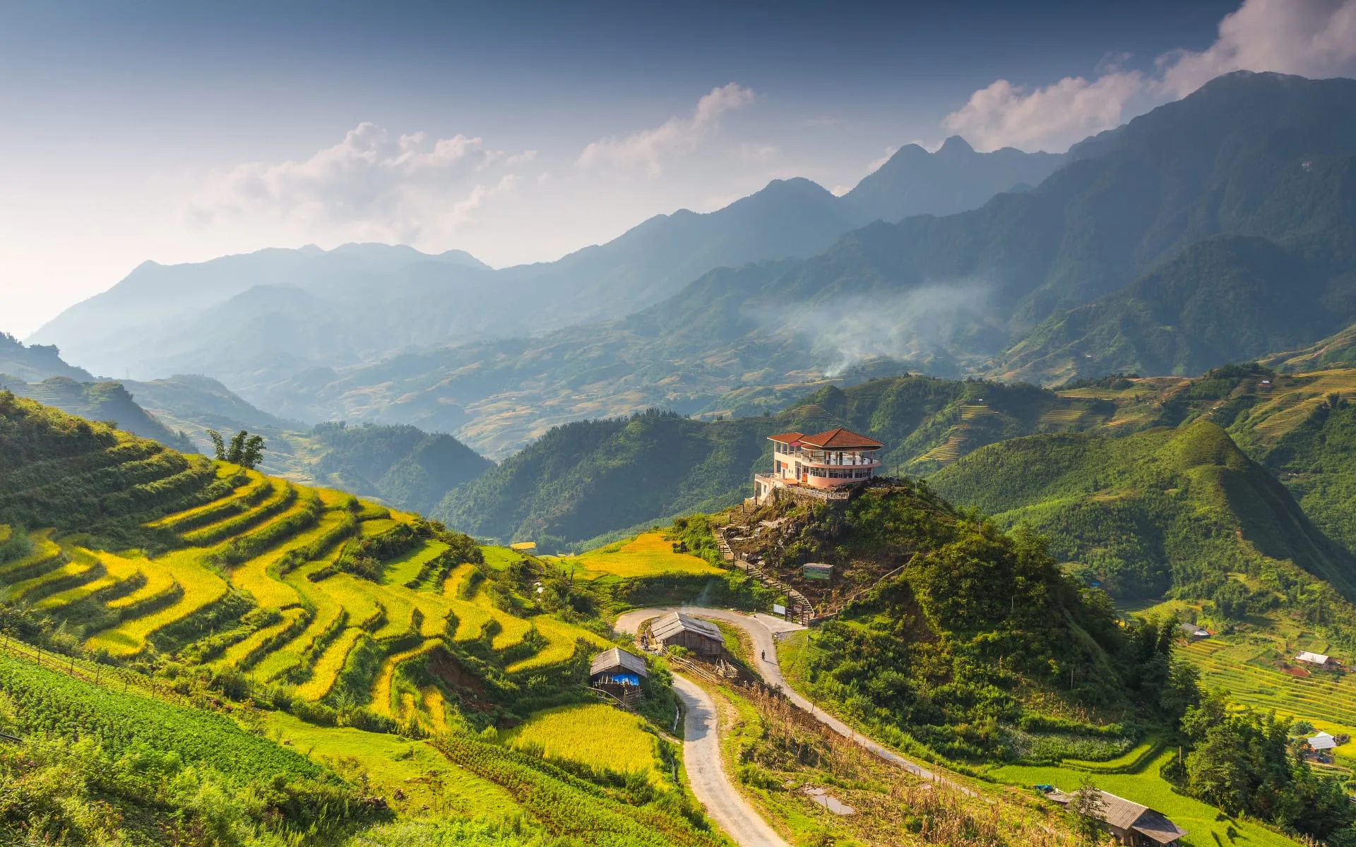 A Hilltop village sits in the Muong Hoa valley terraced fields, near Sa Pa Town, Vietnam.